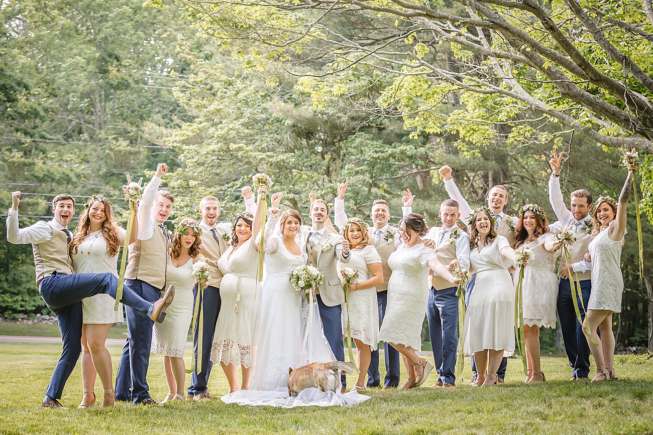 Bridal Party Cheering at Parmelee Farm Wedding in Killingworth CT by Jamerlyn Brown Photography