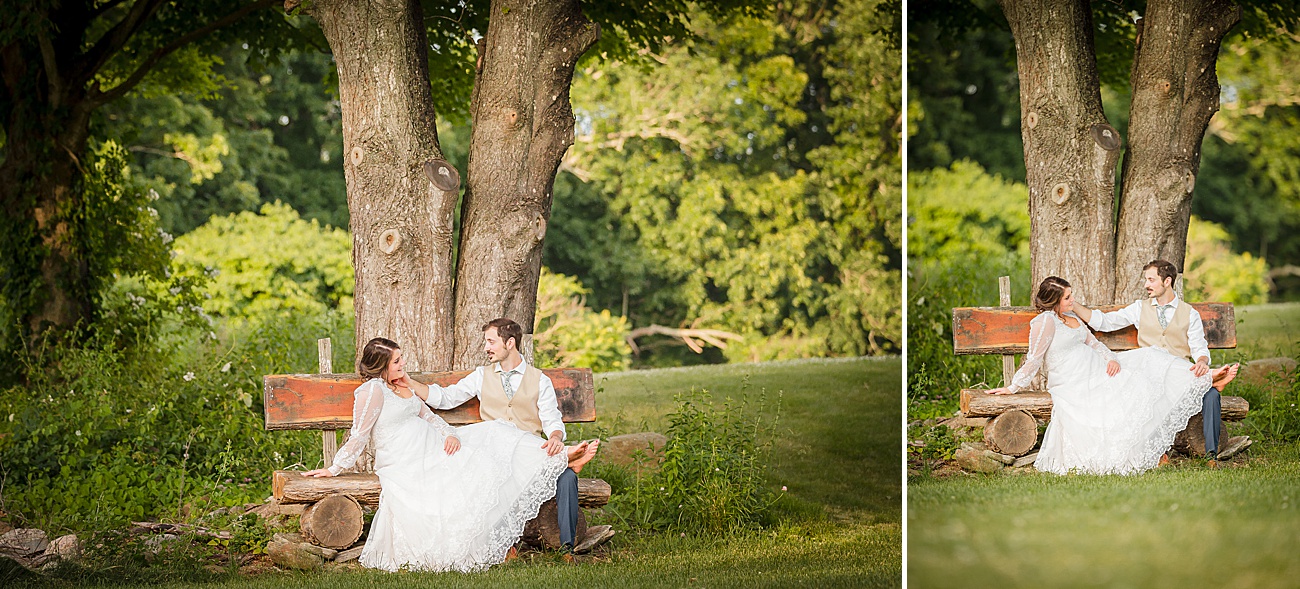 Bride and groom on bench at Parmelee Farm Wedding in Killingworth CT by Jamerlyn Brown Photography