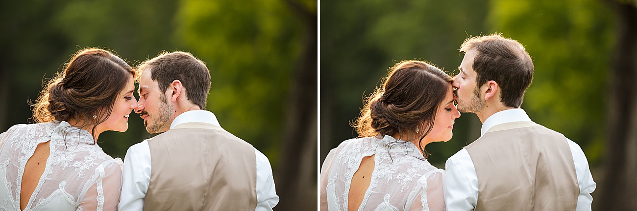Bride and groom kissing at Parmelee Farm Wedding in Killingworth CT by Jamerlyn Brown Photography